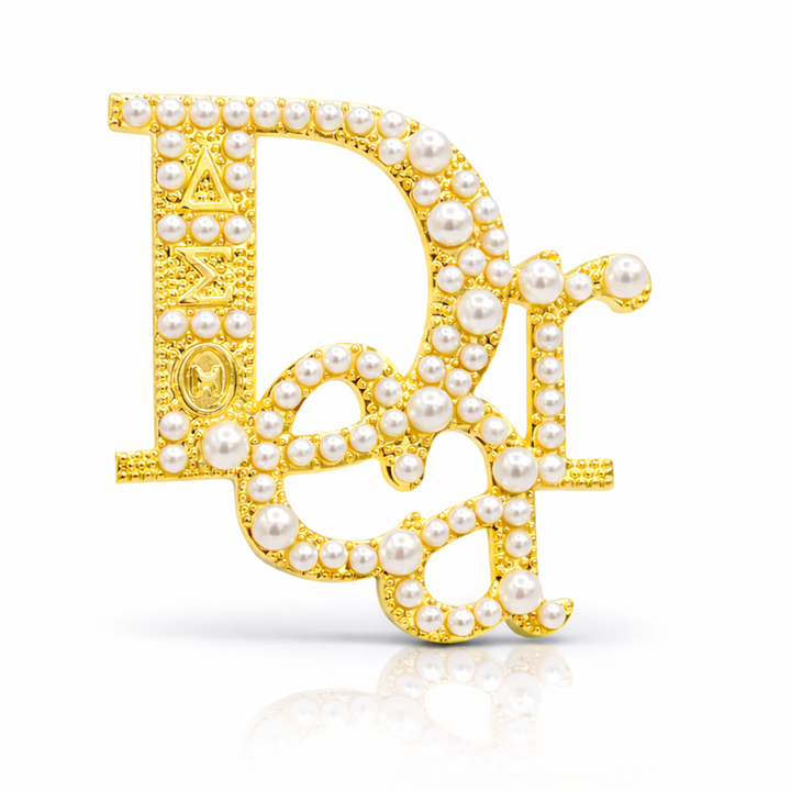 DST DEAR letter pearl brooch pin on a white background