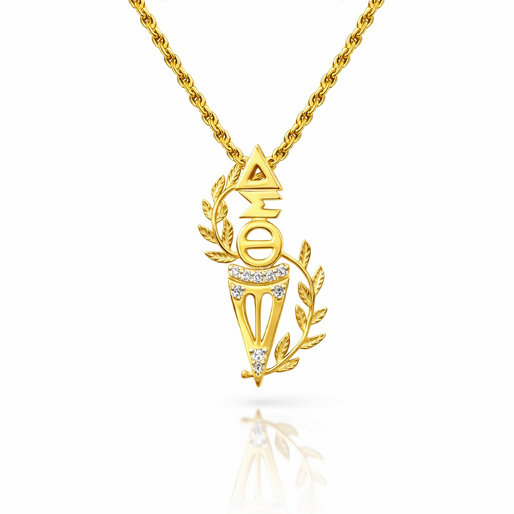 Gold Delta Sigma Theta Torch of Wisdom pendant hanging on a gold chain 