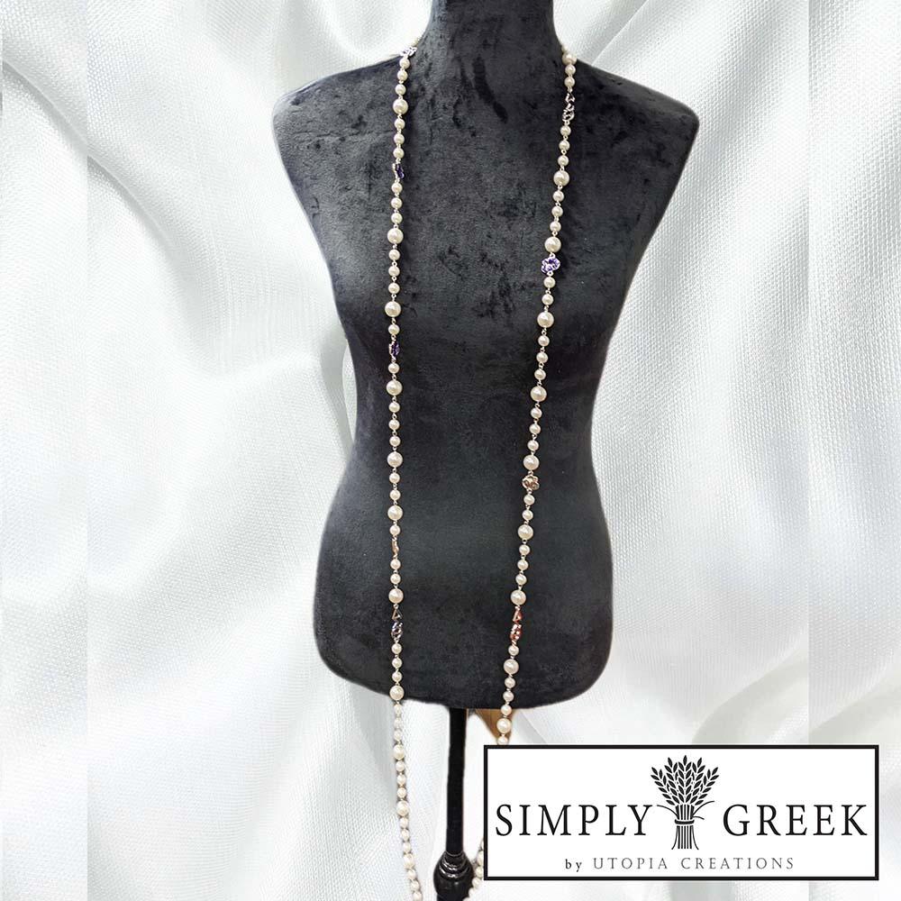 Delta Sigma Theta African Violets and Pearls necklace by Utopia Creations. 