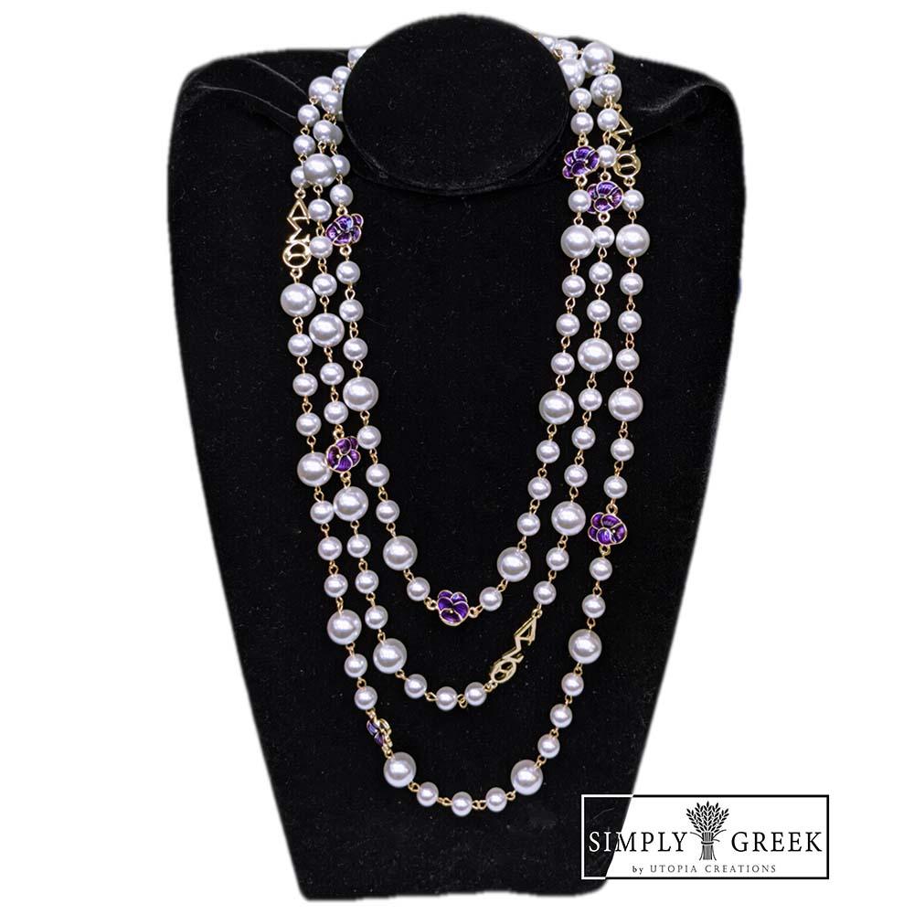 Delta Sigma Theta Violets and Pearls necklace by Utopia Creations. 